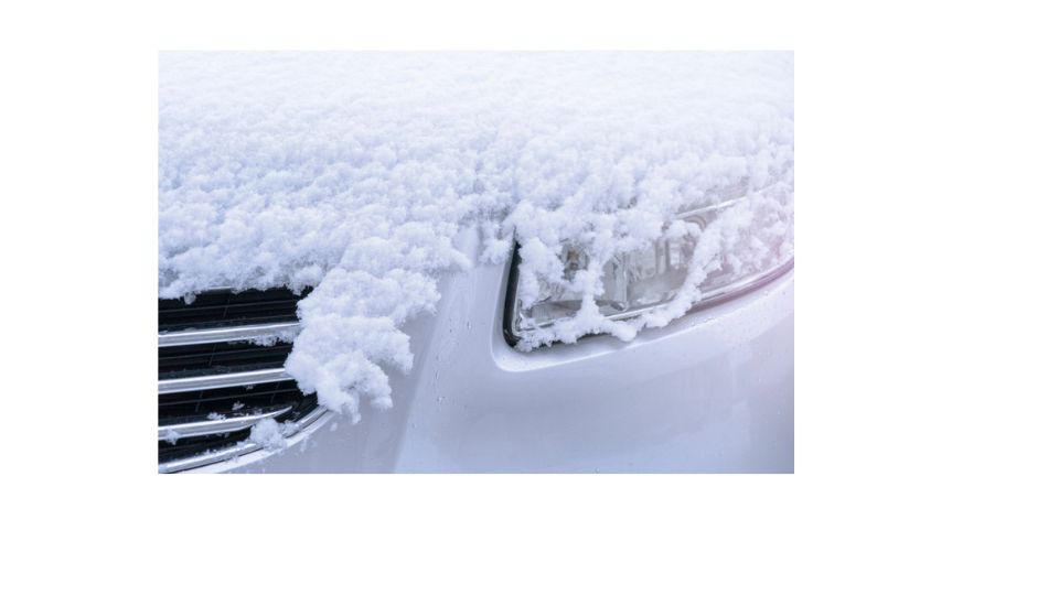 camry covered in snow